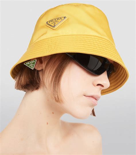 prada canvas bucket hat|Prada re nylon bucket hat.